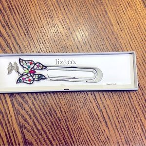 Liz&Co new bookmarked.  Jeweled butterfly with”change is good “ tag